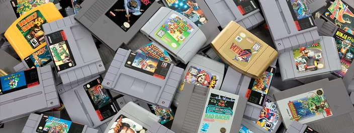 O Super Nintendo Entertainment System (SNES) tinha dois tipos diferentes de cartuchos nos EUA por duas razões principais ?